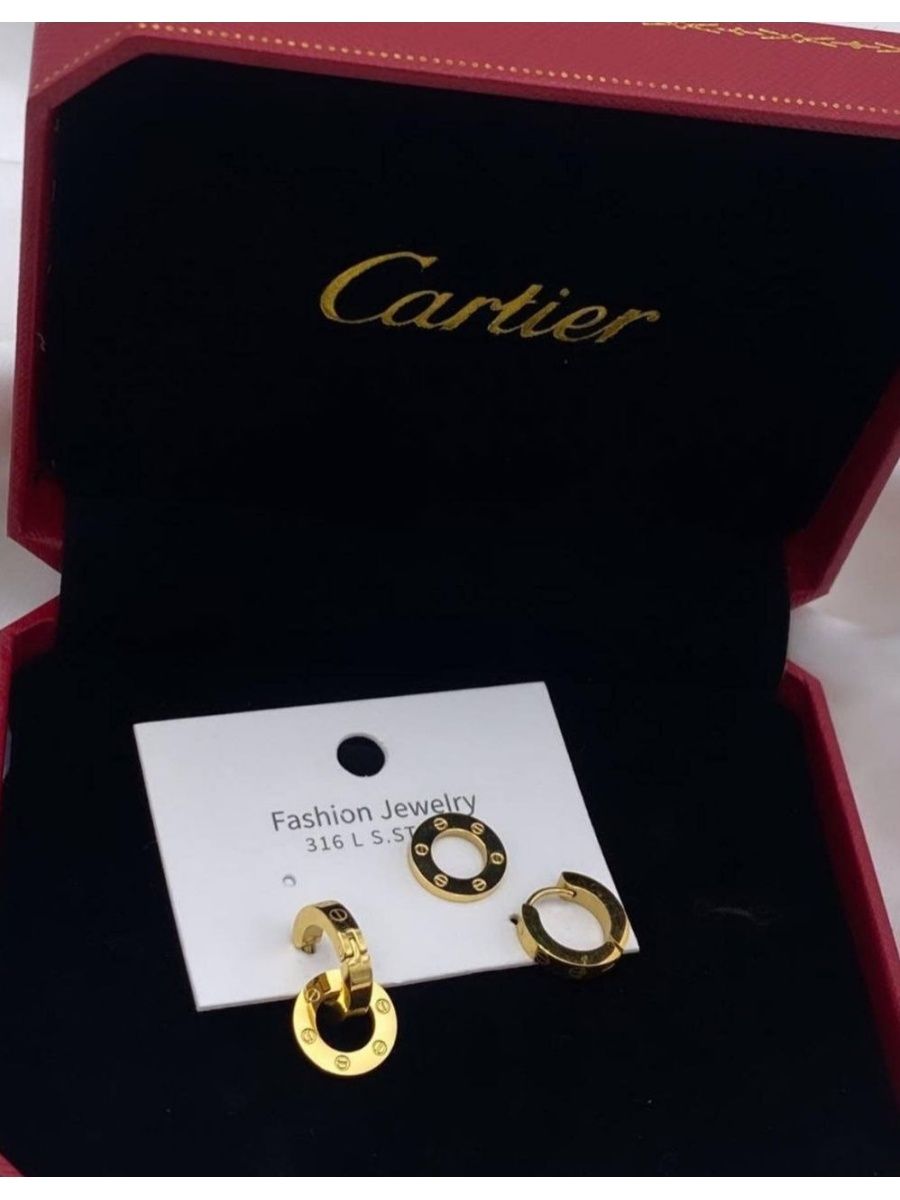 Серьги Cartier круглые.